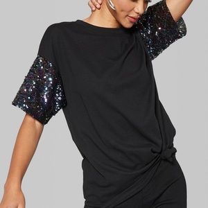 Black crew neck shirt with sequin sleeves